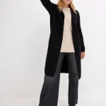 lang zwart vest